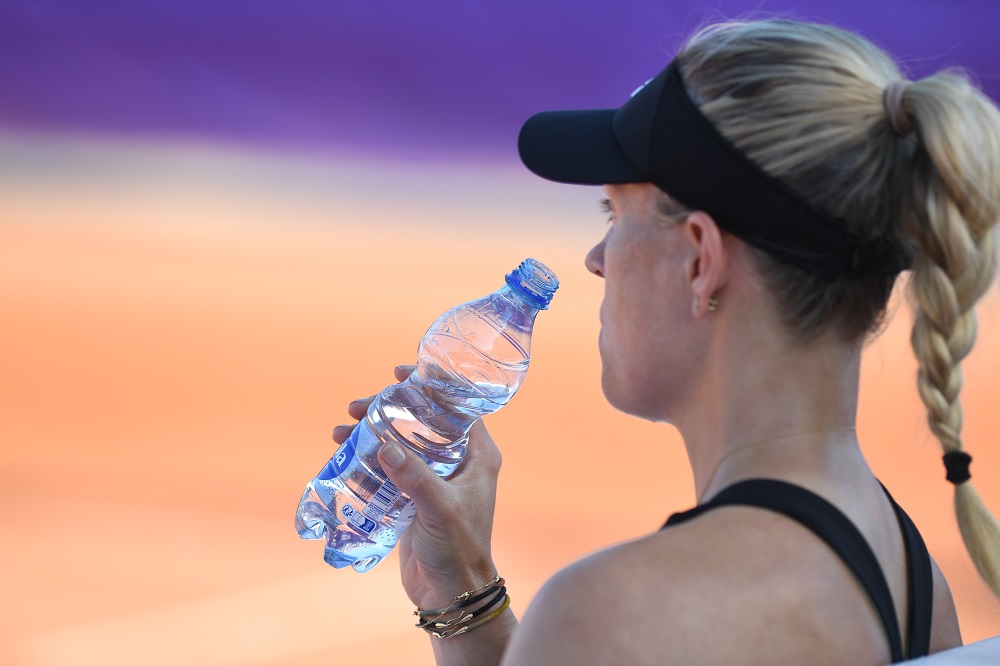boire de l'eau avant, pendant et après le sport